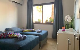 Bedroom With Shared Bathroom And Swimming Pool